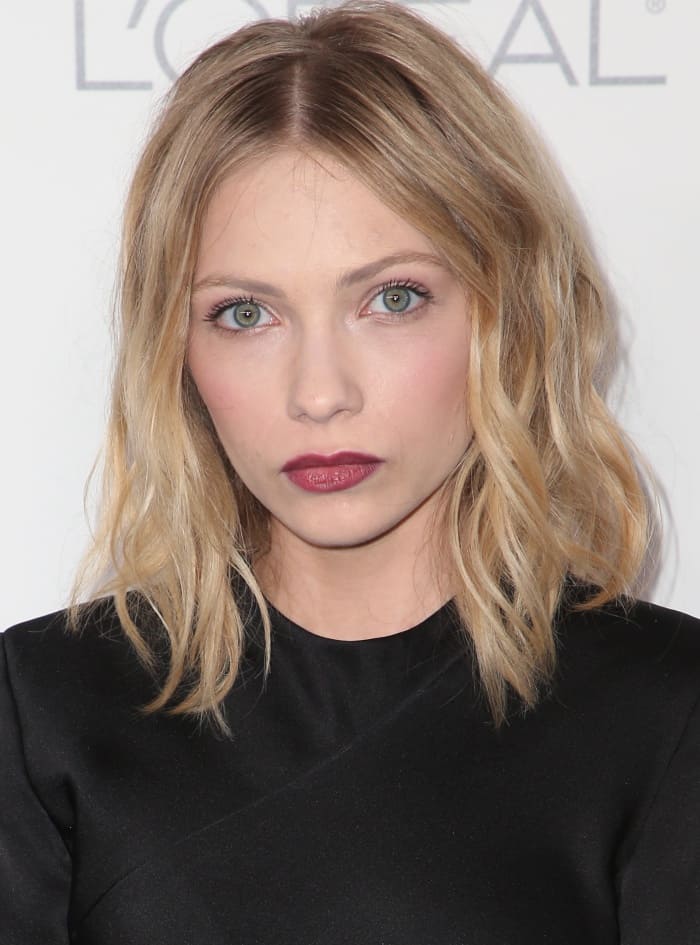 Tavi Gevinson capped it off with tousled waves and a dark red pout