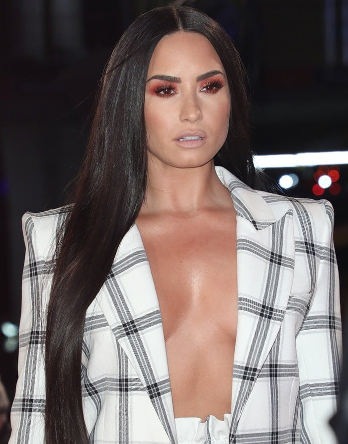 Demi Lovato wearing a Styland suit at the 2017 MTV EMAs red carpet at The SSE Arena in Wembley in London, England, on November 12, 2017