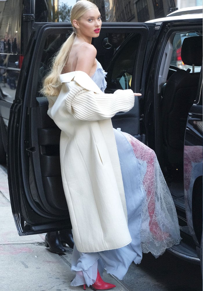 Elsa climbs into her car before heading out to promote the Victoria's Secret Show