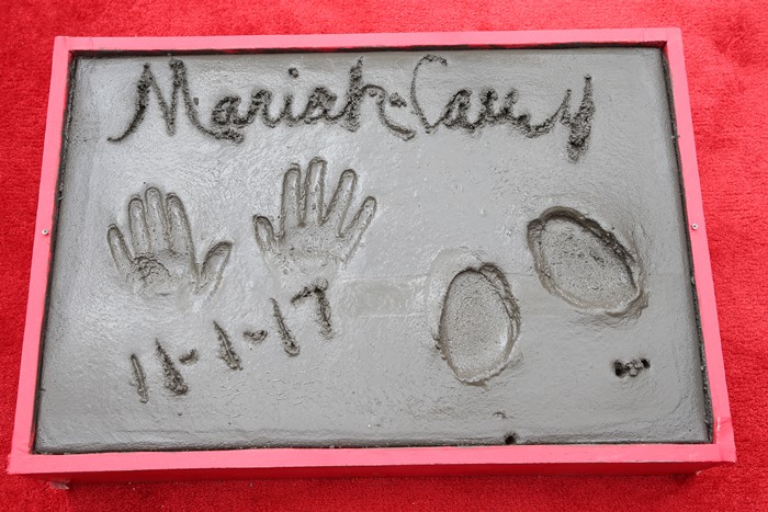 Mariah signed her name and dated the cement block that will be placed outside the famed TCL Chinese Theatre (formerly Grauman’s Chinese Theatre)