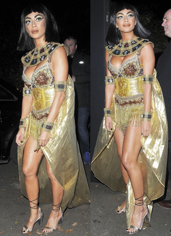 Nicole turns heads in her custom Cleopatra outfit