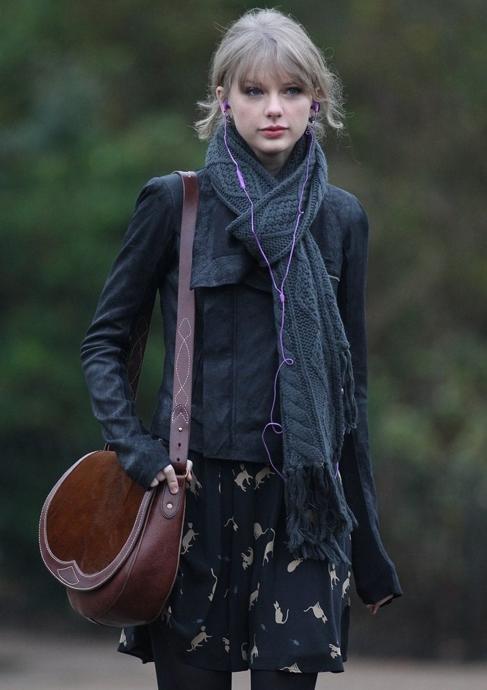 Taylor Swift toting a brown 'Rugby' pony hair saddle bag from Ralph Lauren