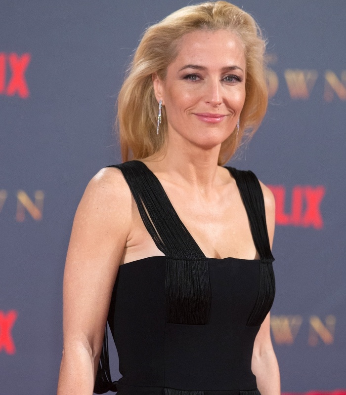 Gillian Anderson wearing a Galvan Resort 2018 jumpsuit at Netflix’s "The Crown" Season 2 world premiere