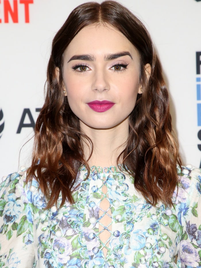 Lily Collins wearing a Zimmermann Spring 2018 dress at the 33rd Film Independent Spirit Awards nominations press conference