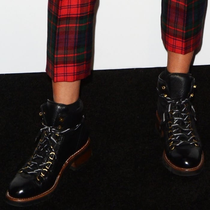 Ruby Rose wearing black lace-up combat boots at the Bulgari "From Rome to NYC" party