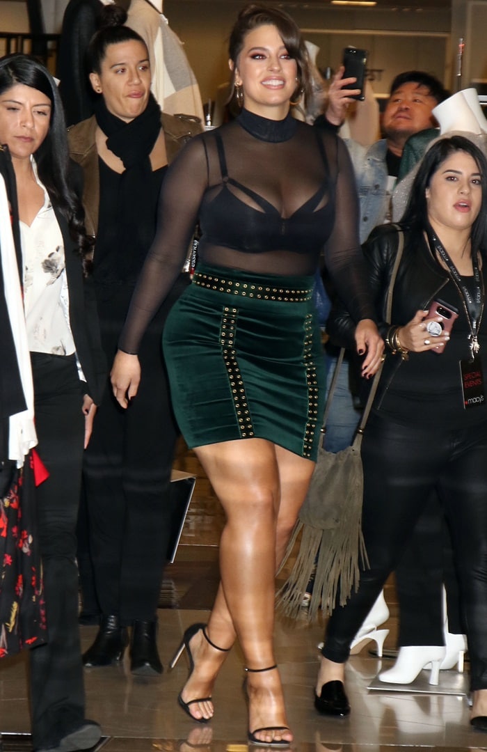 Model, Designer and Body-Positive Activist Ashley Graham completed her revealing ensemble with Jennifer Fisher jewelry and ankle-strap sandals from Stuart Weitzman