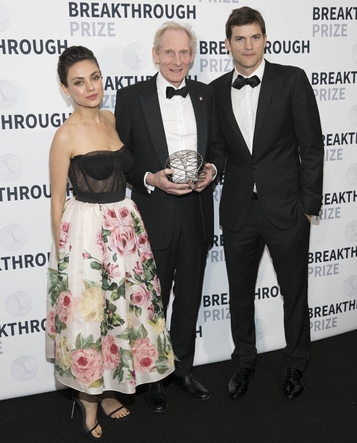 Professor Kim Nasmyth FRS, Whitley Professor of Biochemistry at the University of Oxford and Fellow of Trinity College, Oxford, posing with Ashton Kutcher and Mila Kunis