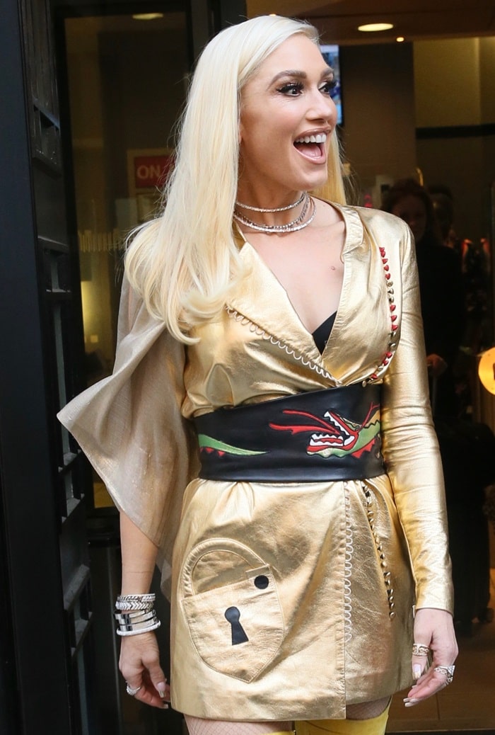 Gwen Stefani arrives at Radio 2 wearing an eye-catching yellow and gold Schiaparelli Spring 2017 Couture ensemble on December 1, 2017