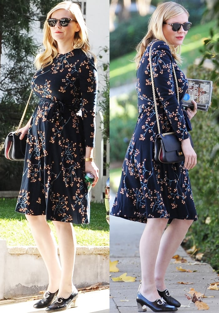 The soon-to-be-mom showed off her bump in a cherry print fit-and-flare dress