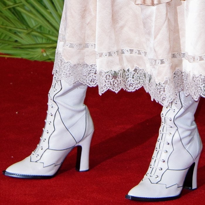 Selena Gomez rocking white Western-inspired boots