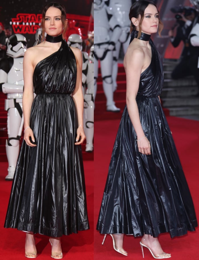 Daisy Ridley wearing a Calvin Klein 205W39NYC black nylon dress and custom Christian Louboutin "Rey" sandals at the "Star Wars: The Last Jedi" UK premiere