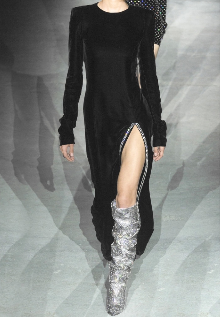Model wearing Saint Laurent’s "Niki" crystal-embellished over-the-knee boots