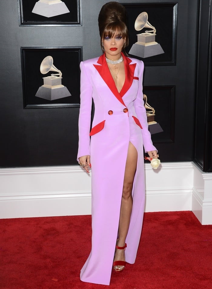 Andra Day wearing a purple and red trench coat dress from Victoria Hayes at the 2018 Grammy Awards held at Madison Square Garden in New York City on January 28, 2018
