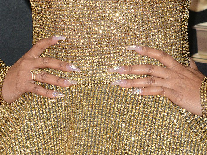 Details of Ashanti's opalescent, holographic nails