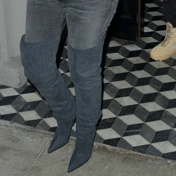 Kim Kardashian wearing pointy-toe Yeezy thigh high boots