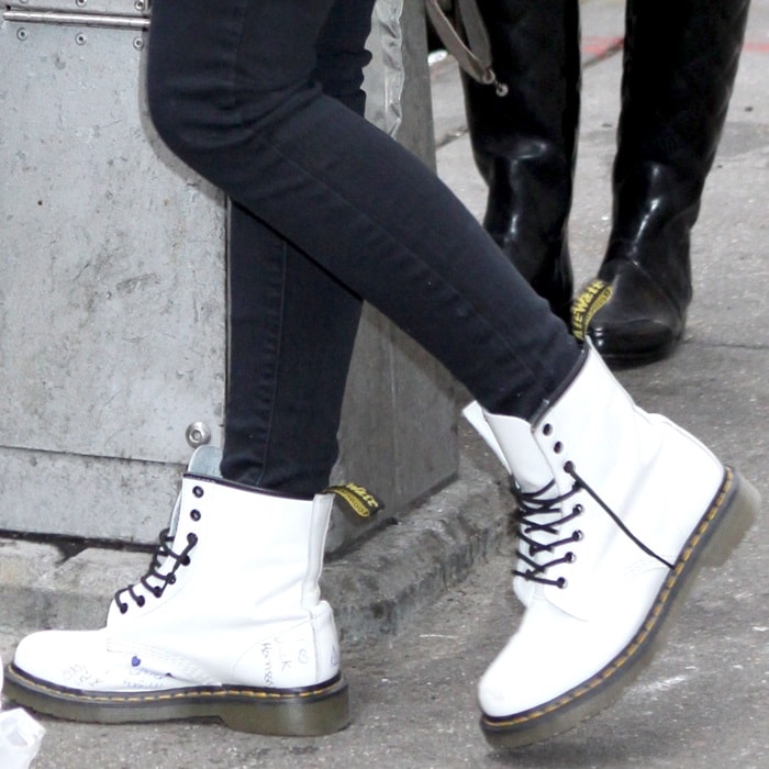 Madonna's daughter Lourdes Leon wearing untied white Dr. Martens boots while leaving the Manhattan Kabbalah Centre in New York City on January 8, 2011