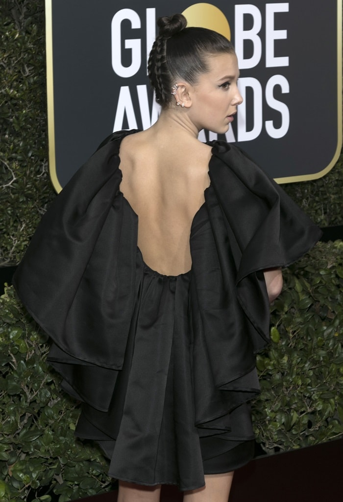 Millie Bobby Brown wearing Calvin Klein by Appointment at the 2018 Golden Globe Awards held at the Beverly Hilton Hotel in Beverly Hills, California, on January 7, 2018