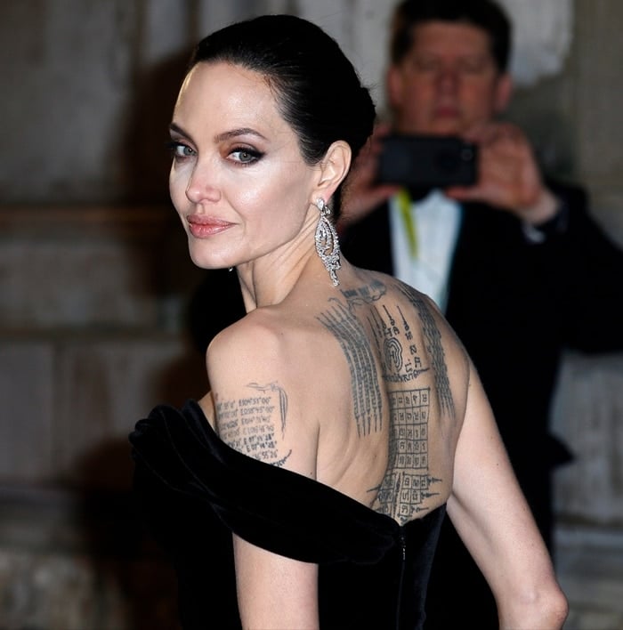 Angelina had the painful ‘protection’ tattoos done in February 2016, just months before her split with Brad Pitt