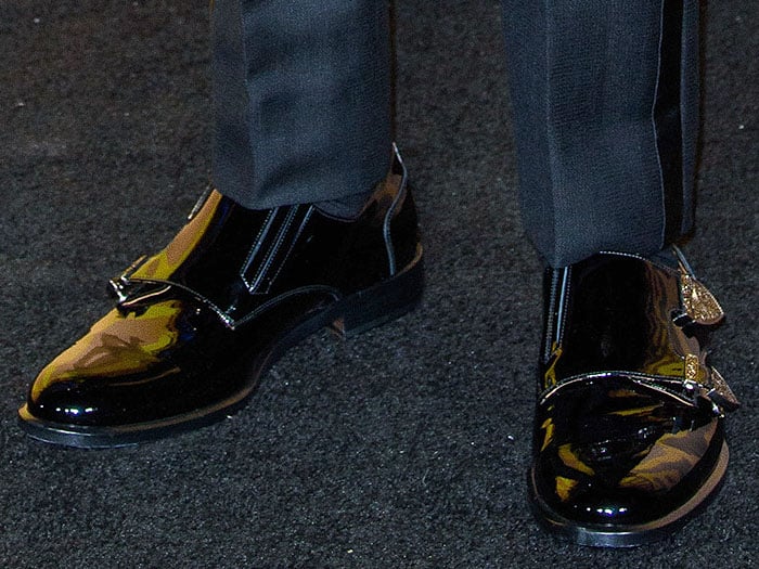 Chadwick Boseman's black-patent double-monk-strap shoes with embellished metal buckles.