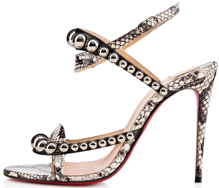 These peep-toe heels are crafted of black smooth leather and ivory and grey snakeskin