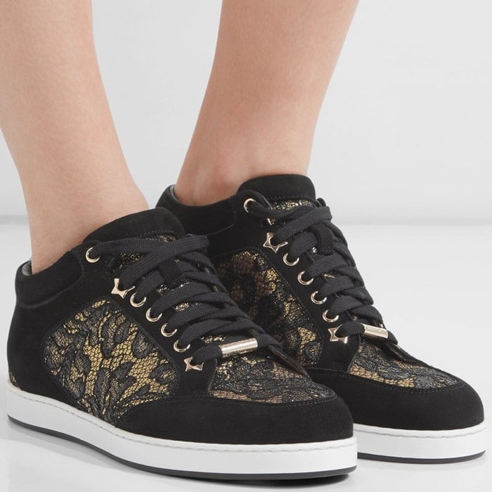 Jimmy Choo's 'Miami' sneakers have intricate floral-lace panels that are highlighted by the gold background. Made from soft black suede, they're finished with padded cuffs and a smooth leather lining to ensure comfort. Show yours off with cropped jeans. 