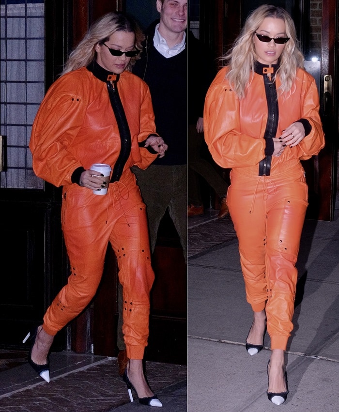 Rita Ora leaving her hotel in a crazy orange outfit from Tom Ford's Spring 2018 collection in New York City on February 1, 2018