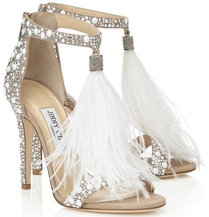 The upper is white suede with hotfix crystal embellishment, then finished with a white ostrich feathers tassel