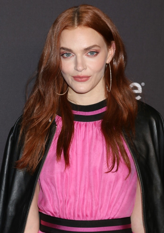 Madeline Brewer's Designers Remix leather jacket and fuchsia pleated halter mini dress