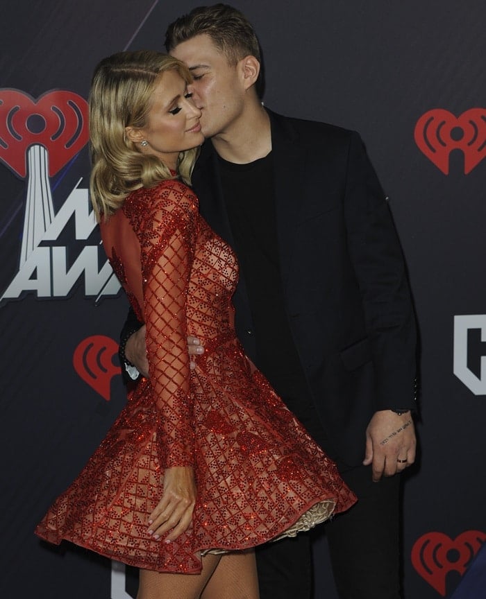 Paris Hilton and Chris Zylka coupled up on the red carpet