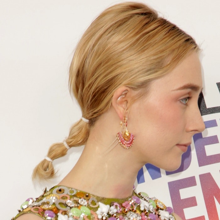 Saoirse Ronan wearing Piaget 'Sunny Side of Life' High Jewelry earrings