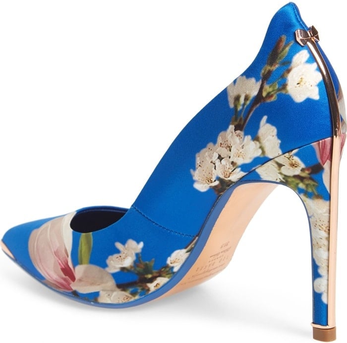 An eye-catching print adds sophisticated character to this lofty, pointy-toe pump