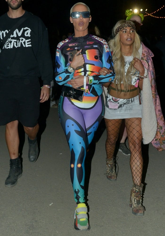 Amber Rose in a rainbow-colored bizarre skeleton suit from Belgian designer Walter Van Beirendonck's menswear collection