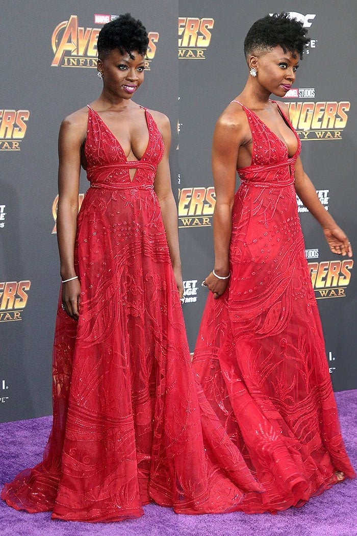 Danai Gurira in a Zuhair Murad Spring 2018 embellished red gown with matching glittery, red Jimmy Choo sandals.