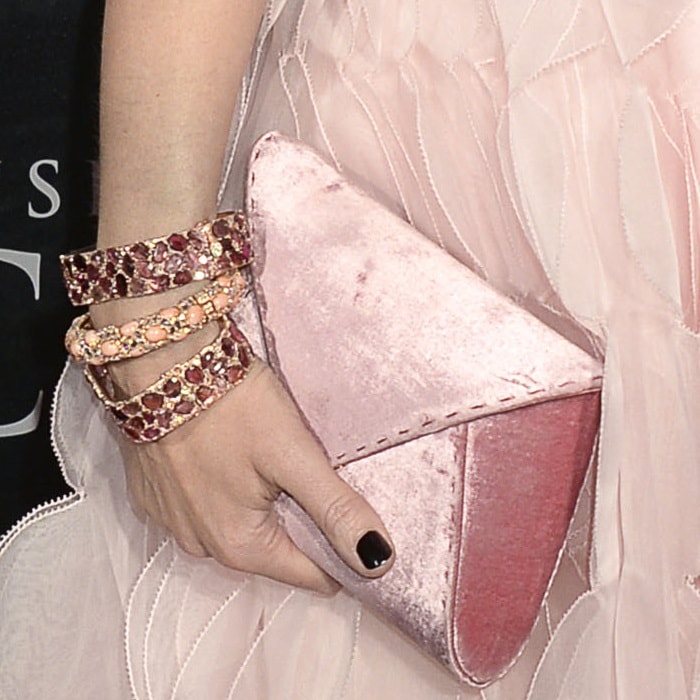 Emily Blunt's chunky bangles and pink velvet 'Lee Pouchet' clutch from Tyler Ellis