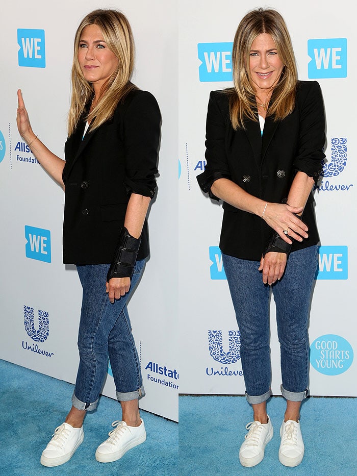 Jennifer Aniston looked to be in good spirits despite her hand injury