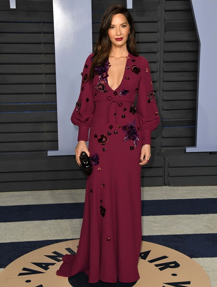 Olivia Munn's burgundy Andrew Gn Pre-Fall 2018 dress