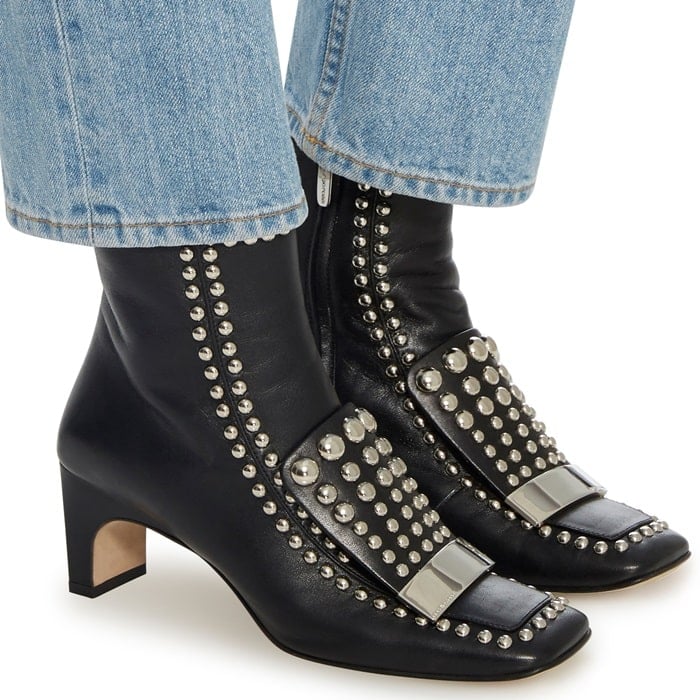 This SR1 ankle boot is rendered in nappa and features all over studded embellishments and a square toe