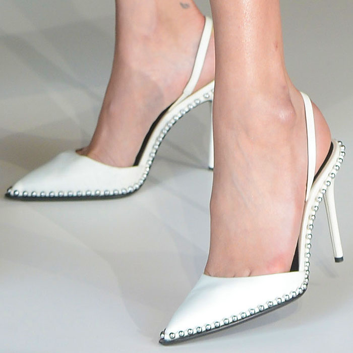 Bella Hadid's feet in white Alexander Wang 'Rina' slingback pumps.