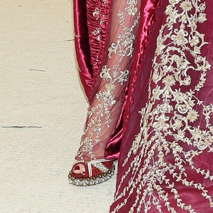 Details of the custom Louboutin embellished-platform peep-toe sandals on Blake Lively.