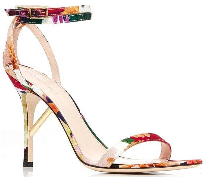 This sandal is rendered in rayon and features a stiletto heel and floral pattern