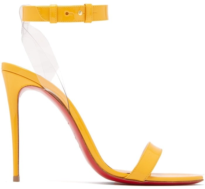 These yellow Jonatina sandals feature clear PVC straps that offer leg-lengthening possibilities