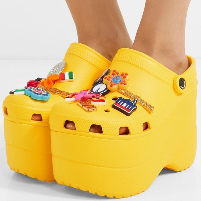 Taking the iconic rubber clog to new heights, this yellow creation is set on a towering platform and decked out with plenty of colorful bling