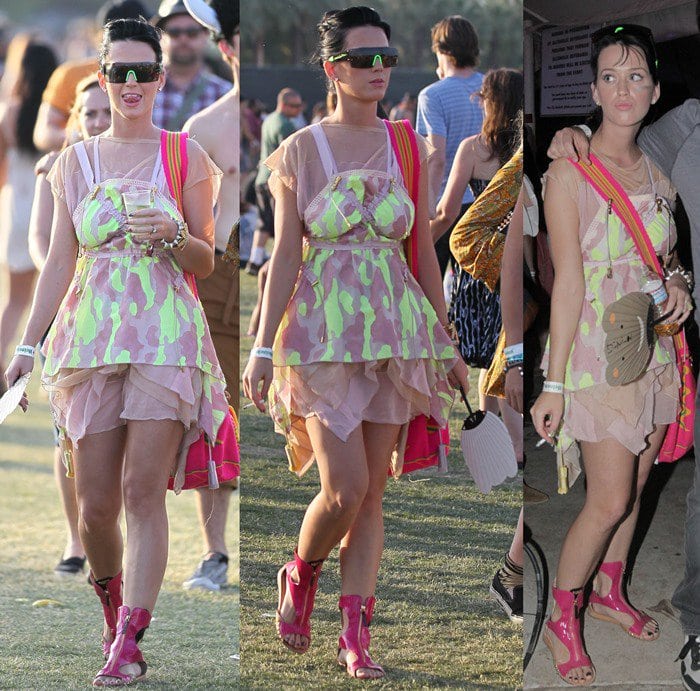 Katy Perry masters festival fashion by pairing a neon-printed ruffled dress with bold pink gladiator sandals, futuristic sunglasses, and playful accessories for a fun, standout Coachella look