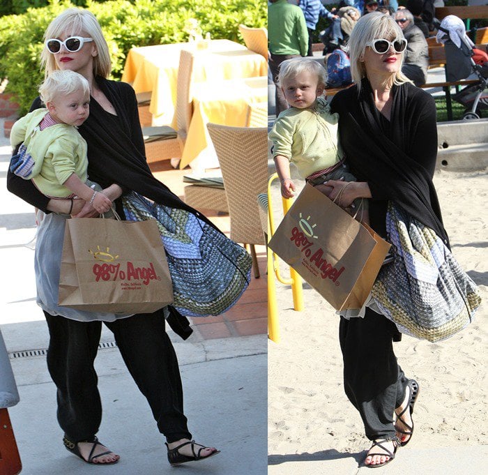 Gwen Stefani in Malibu wearing a pair of L.A.M.B. Dacey sandals featuring cutouts and buckled strap details at the heel