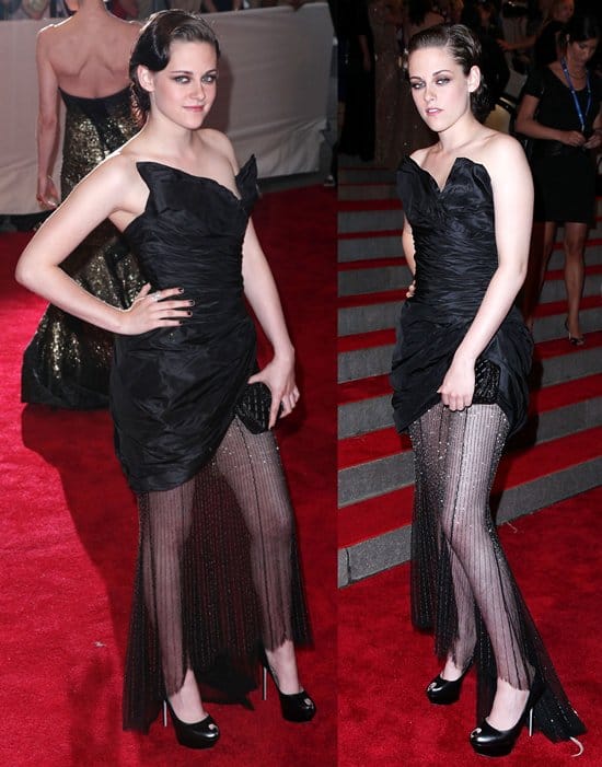 Kristen Stewart at the Costume Institute Gala Benefit, showcasing her unique style in a Chanel asymmetrical dress with sheer detailing, a mix of classic elegance and modern edginess