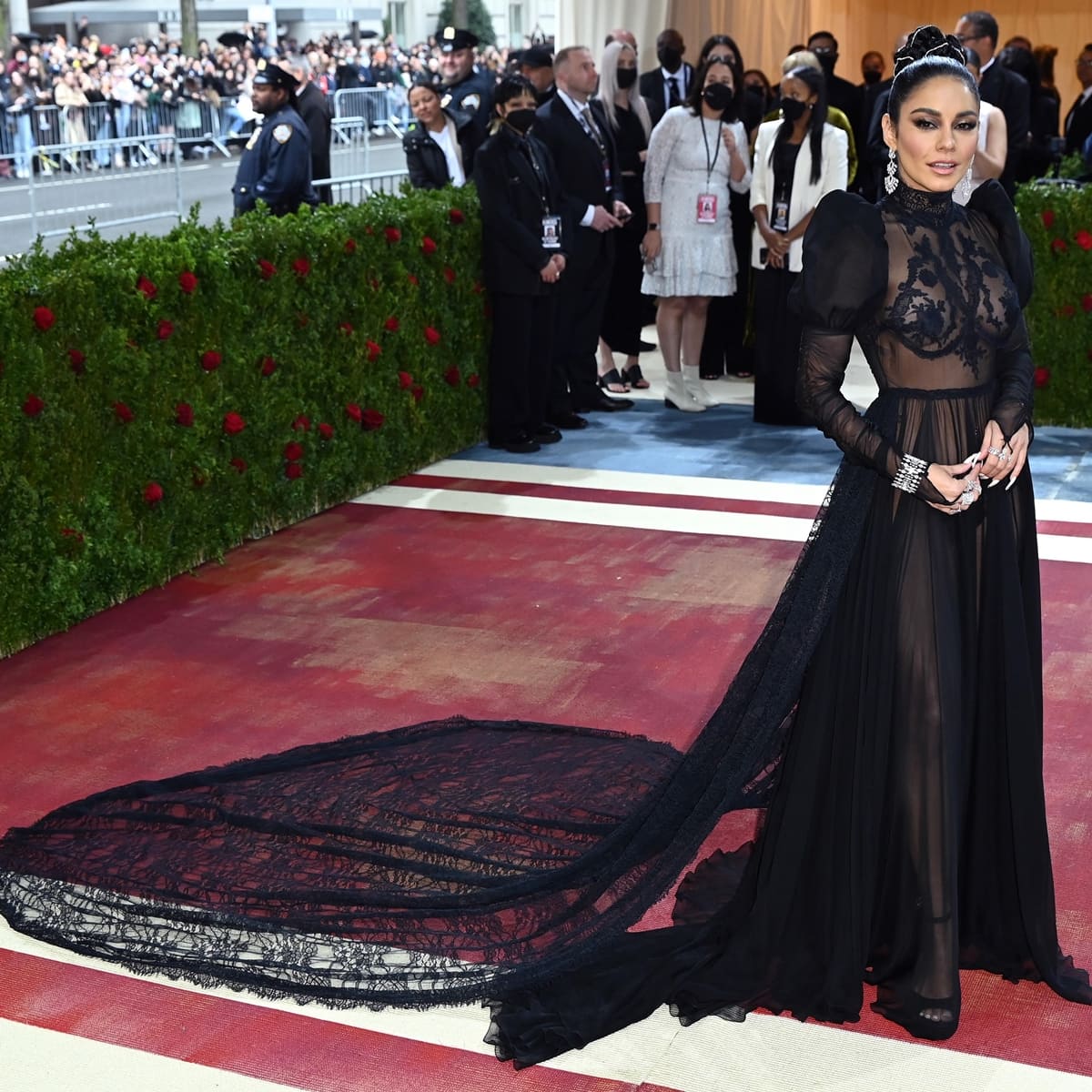Vanessa Hudgens in a black sheer Moschino dress at the 2022 Met Gala Celebrating "In America: An Anthology of Fashion"