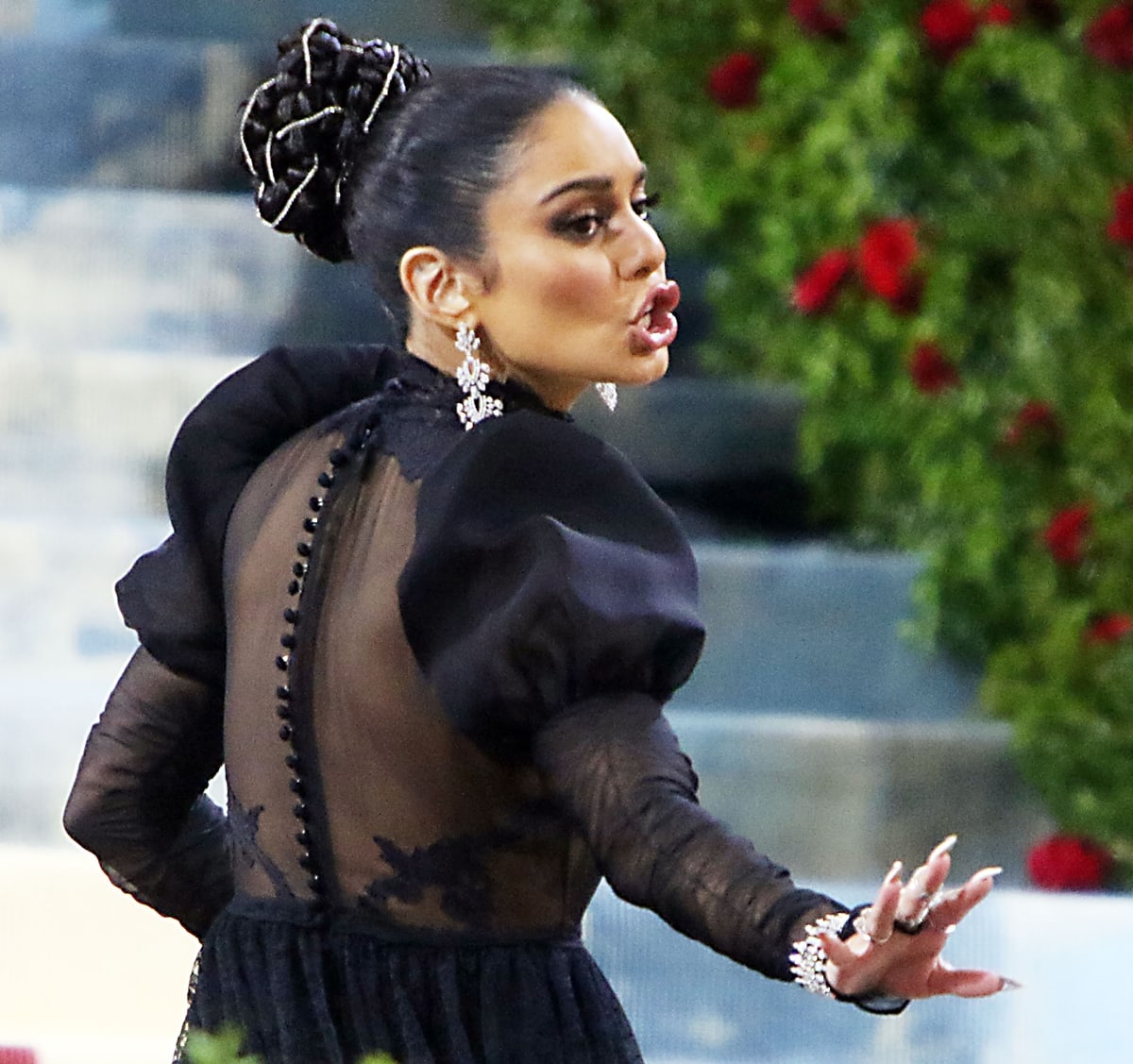 Vanessa Hudgens accessorized with stunning jewelry by Messika and an intricately braided bun