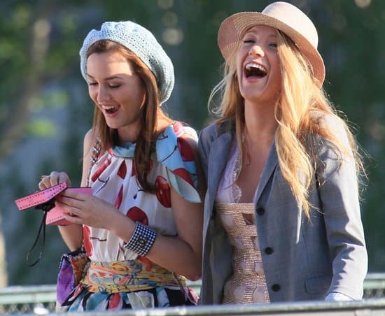 Effortlessly Chic and Joyful: Leighton Meester and Blake Lively exude happiness on the streets of Paris, blending bold prints and colors in a delightful fashion statement