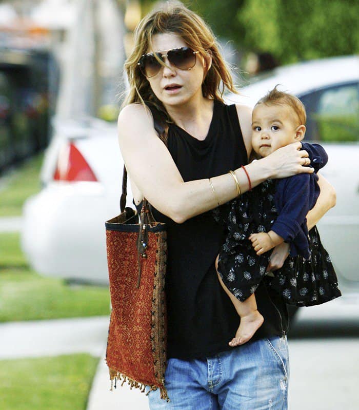 Ellen Pompeo carrying a bohemian JADEtribe fringe tote