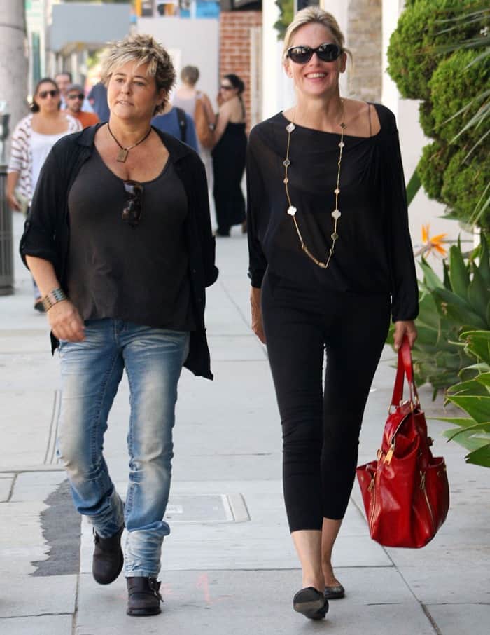 Captured on a sunny day in Beverly Hills, Sharon Stone enjoys a shopping spree accompanied by a friend, on August 17, 2010